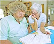 Kathleen and Ray Blount of the Royal Oaks region of Prunedale go over some of the paperwork and letters they&rsquo;ve exchanged with the Department of Veterans Affairs, which listed Ray Blount dead and unmarried. He&rsquo;s still alive and has been wedded to Kathleen for 37 years. 