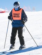 Ivan Castro, a blind war vet, skis down the slope: "You know when you're blinded, you don't know what life is." 