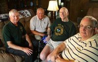 From left, Herb Ganner of Hurst, Ed Landwehr of Fort Worth, Lowell Shaw of Plano and Tony Bissell of Bedford served in the Ghost Squadron, which flew missions into Laos from an air base in Thailand. 