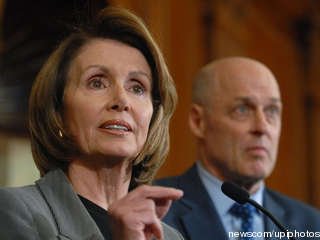 Speaker of the House Nancy Pelosi speaks alongside Treasury Secretary Henry Paulson