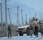 AFP/File – NATO and US soldiers are seen standing guard in Kabul.