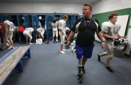 Nathan Potts returned to coach football after leaving the game to serve in the military - Julio Cortez Chronicle