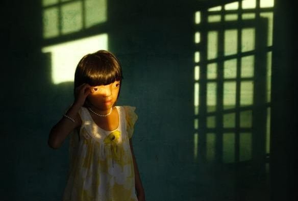 Nine-year-old Ly is pictured in a portrait taken by Ed Kashi, with VII Photos, who lives in New Jersey