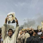 ap_egypt_protest_mubarak_portrait_29jan11_eng_480
