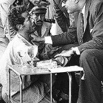 220px-Nasser_giving_job[1]