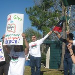 Ahmed Addarrat raises the new Libyan flag