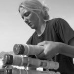 Senior Airman Margot Hubbard, 455th Expeditionary Operations Group, prepares 30 mm ammunition rounds