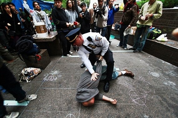 OccupyWallStreet_TakeWallStreet_Juan_Carlos_Hernandez_cops_indignados_indign_s_Manhattan_New_York_people_police_politics_Protest_USA_NYPD_violence_liberty_of_speech.fir_