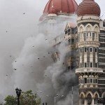 Smoke billows from the Taj Mahal hotel in Mumbai on November 29, 2008.