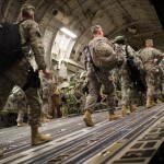 US soldiers board the last C17 aircraft carrying US troops out of Iraq