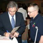 wolfowitz signs autograph for vet