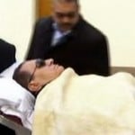 Mubarak on strecher