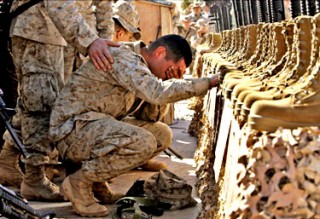 US Marine cries at memorial for fellow Marines