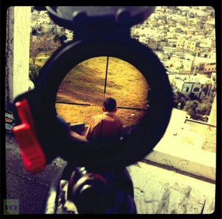 An IDF soldier in the Occupied Palestinian Territories places the cross-hairs of his rifle on the head of a Palestinian child showcasing the thrill of killing a Palestinian Child on his Instagram account. This reflects a political and military culture that condones the killing of innocent Palestinians.