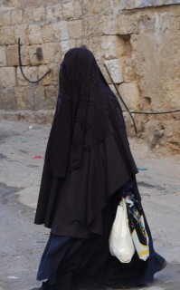 This is not a MB woman in Niqab, it is a Haredi Jew, Beit Shemesh, Tel Aviv