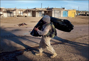 A US Marine carrying his dead buddy in a body bag in Iraq. It's heartbreaking to see young guys at the VA hospital in wheel chairs waiting to get catheters, many of them with severe brain injuries. And realizing the dead and wounded civilians of all ages from the nation attacked makes it even worse. Are Israel and politicians' careers worth it?