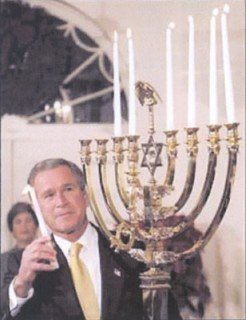 George W. Bush lights a menorah celebrating Jewish victory over America.