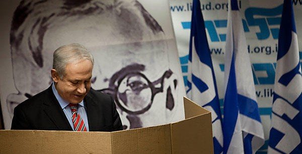 I had to add this...a wall size head shot of terrorist Begin IN the voting station !!!