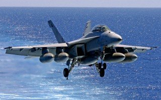 The trick is to get beat up planes back to the Carrier when Russian arms are shooting at them, reload, refuel and go again.