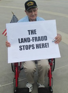 Aldo Dipre`, a 94-year old disabled World War II Veteran, puts the VA on notice with his message to passing motorists at a Sunday Rally of the Veterans Revolution.