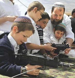 Israeli kids being trained in automatic weapons, just in case God fails (again).