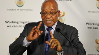 South Africa President Zuma gestures as he answers questions from journalists in Pretoria