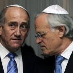 Former PM Ehud Olmert (L) is now in prison for corruption