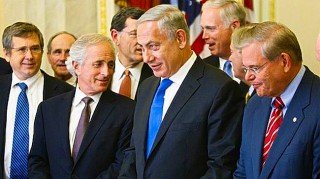 Israeli Prime Minister Benjamin Netanyahu (C) meets with members of the Senate Foreign Relations Committee, including Chairman Robert Menendez (R) and ranking member Senator Bob Corker (2nd L), in Washington