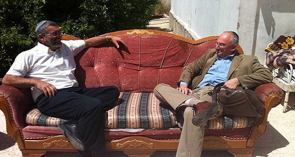 April 2012 Knesset members Michael Ben-Ari (left) and Aryeh Eldad on evicted Natcheh family’s sofa in Beit Hanina.