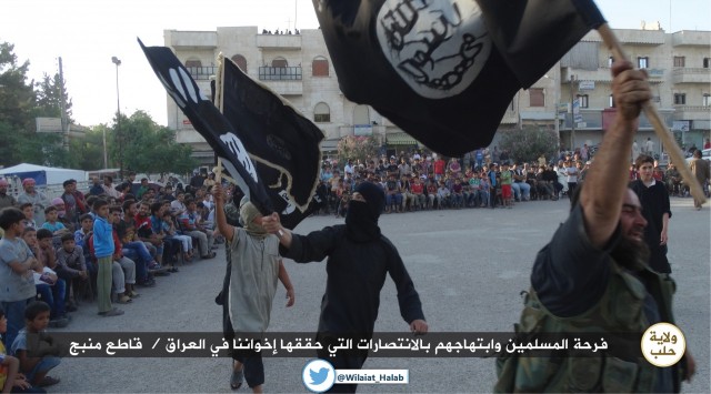 ISIL militants in (Manbij, Aleppo) Rejoicing over the capture of Iraqi city of Mosul. June 11, 2014