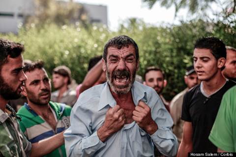 Anguished father at son's Gaza funeral
