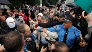 In Kiev angry protestors called for resignations of both Poroshenko and the Defense minister