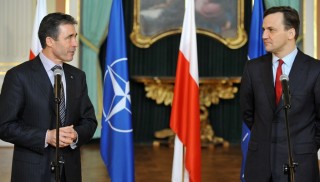 NATO Secretary General Anders Fogh Rasmussen and Polish Minister of Foreign Affairs Radoslaw Sikorski