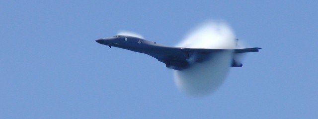 Pensacola Beach AirShow on July 12, 2002. As USAF B1B, 85-0064, from the 127th BS/184th BW, Kansas ANG made its high speed pass approaching the sound barrier, this photo catches the shock wave.