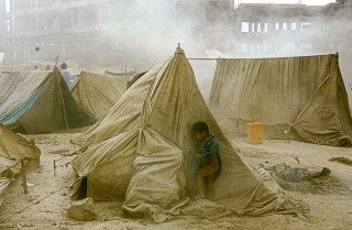 Afghani boy in refugee camp