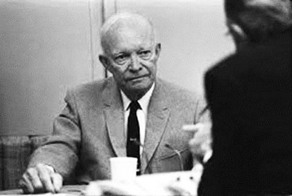 Eisenhower holding forth within Columbine Two