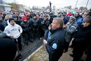 Bosnians in St. Louis gather to protest what they consider to be a racially-motivated murder of Zemir Begic