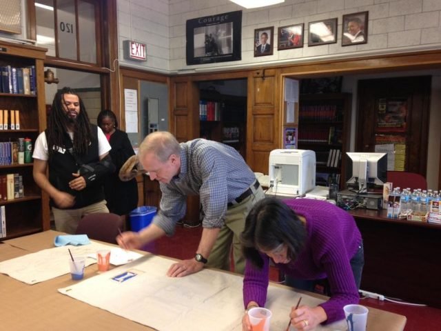 Illinois Gov. Bruce Rauner and his wife, Diana Rauner, paint a University of Illinois banner during a service day at Gage Park High School in Chicago commemorating Martin Luther King Jr. Day, Monday Jan. 19, 2015. The Republican governor later signed an executive order he said was aimed at lowering the unemployment rate for minorities and veterans. (AP Photo/Sara Burnett) Read more: http://www.washingtontimes.com/multimedia/image/ap_debe6ef6131db4036b0f6a706700fe98jpg/#ixzz3POVs2RPq Follow us: @washtimes on Twitter 