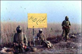 Iranian troops with gas masks -- Gas cannisters compliments of the Ronald Reagan administration