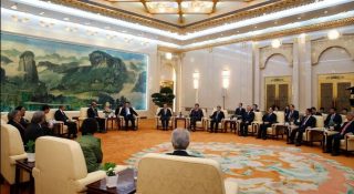 Chinas President Xi Jinping met with other government officials to sign a memorandum to start the Asian Infrastructure Investment Bank