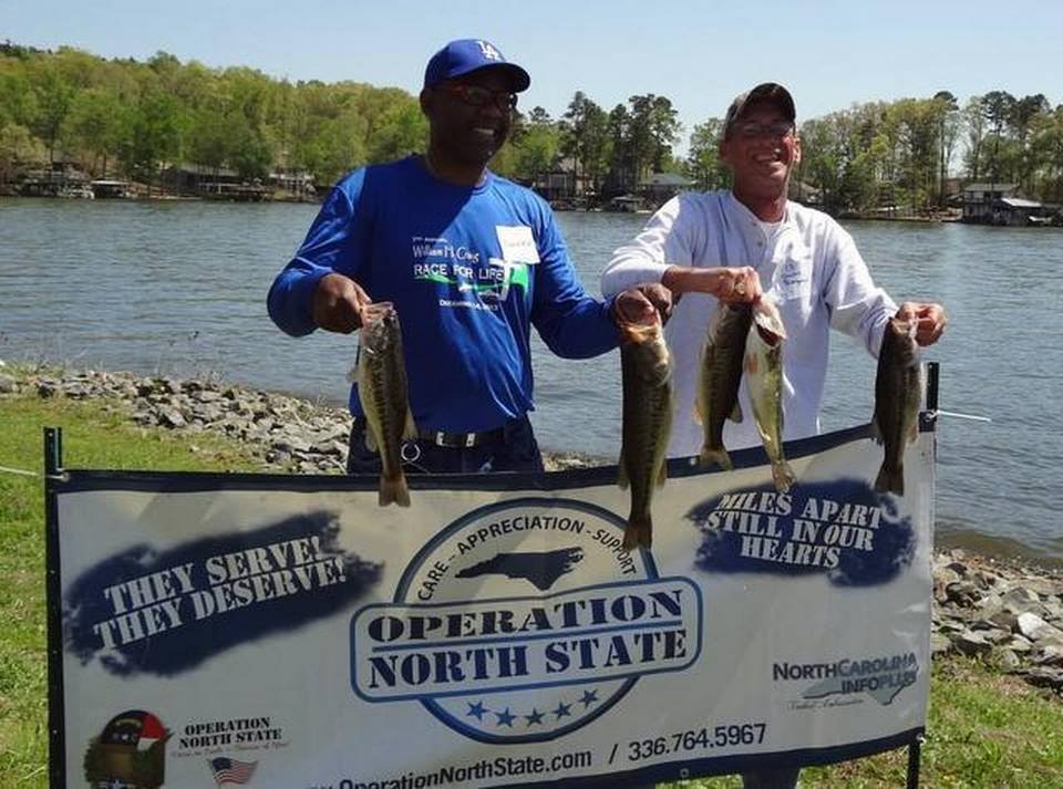 Wounded Warrior Derrick Mitchell, left, and fishing host Sherrill Bumgarner celebrate their catches during a Top Shelf Fishin’ Festival at Badin Lake last April. Lake Norman will host the event for the first time next month. COURTESY OF TERRY SNYDER Read more here: http://www.charlotteobserver.com/news/local/community/lake-norman-mooresville/article12620441.html#storylink=cpy