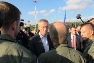 NATO Secretary General Jens Stoltenberg meets with U.S. Air Force personnel at Lask air base in Poland