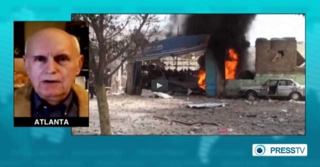 This is a studio screen grab - Click link below to watch interview