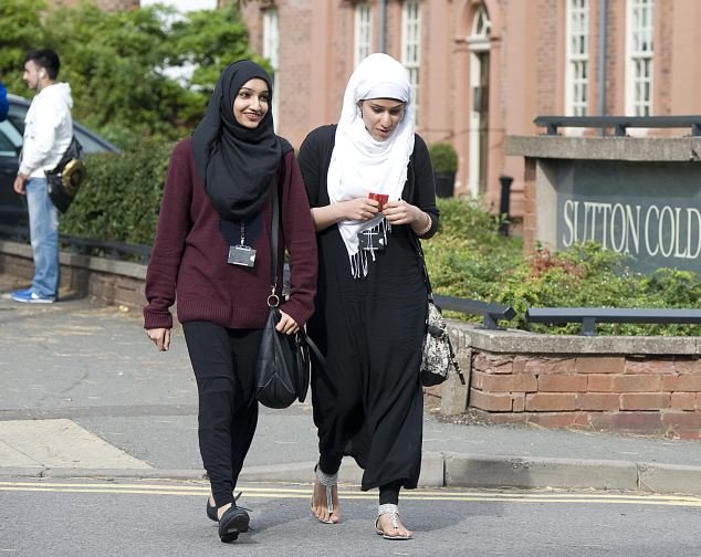 Two Muslim students at the Birmingham Metropolitan College campus in Sutton Coldfield, West Midlands. The college have banned Muslim girls from wearing a veil. Picture by Damien McFadden/Daily Mail : 07968 308252.