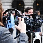 student journalist filming