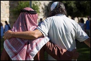 Israeli Palestinian hug