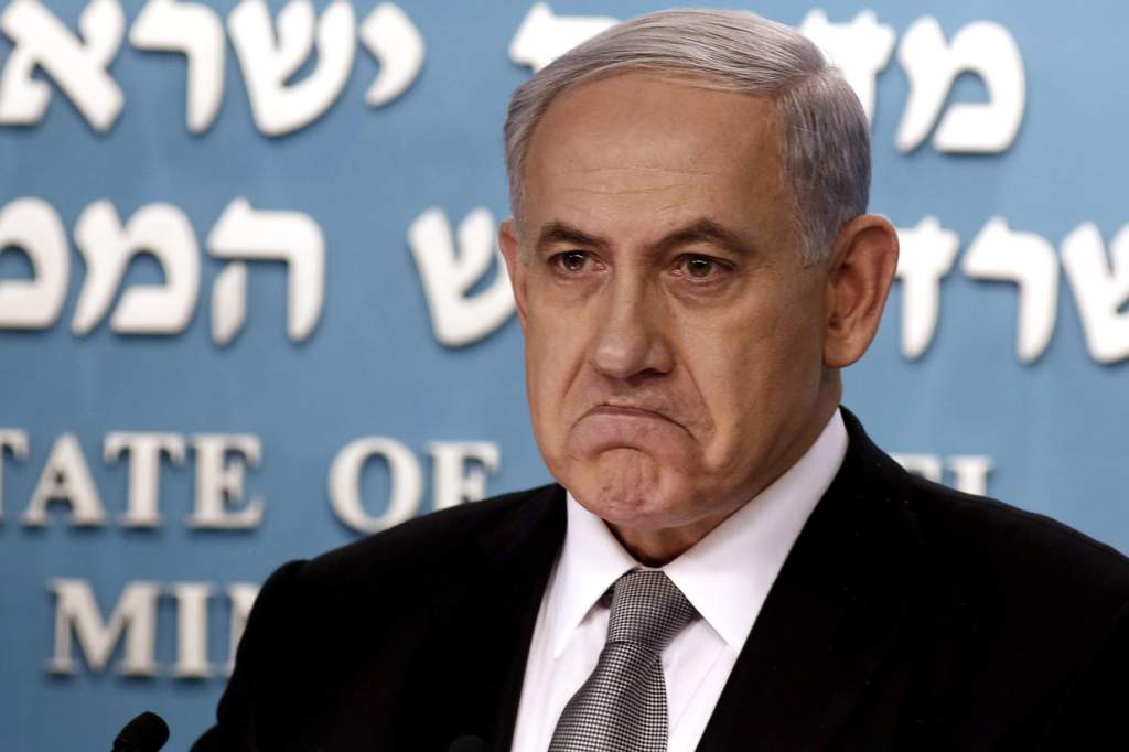 Israel's Prime Minister Benjamin Netanyahu is pictured during a news conference at his office in Jerusalem December 2, 2014. Prime Minister Benjamin Netanyahu sacked his finance and justice ministers on Tuesday, signalling the break up of his bickering coalition and opening the way for early national elections in Israel. REUTERS/Gali Tibbon/Pool (JERUSALEM - Tags: POLITICS TPX IMAGES OF THE DAY)