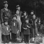 Photograph_of_Members_of_the_Mochida_Family_Awaiting_Evacuation_-_NARA_-_537505