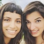 Alysha Brilla (left) poses with one of her sisters