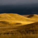 storm-clouds-over-the-prairie-badlands-national-park-ron-mcginnis